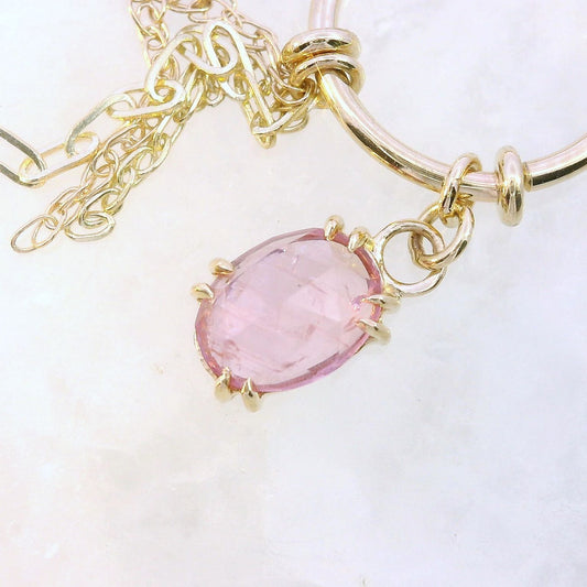 Chain Ring - Oval Pink Umba Sapphire Yellow Gold